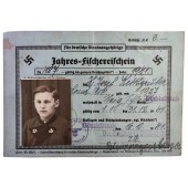 Licencia anual de pesca para niño de 14 años fechada en 1941