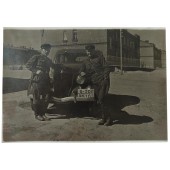 Two Soviet officers at the car