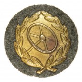 Driver's badge in Gold on feldgrau cloth