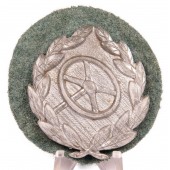Silver grade driver badge in zinc