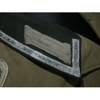 The combat worn tunic for Feldwebel from the 377th infantry regiment. Espenlaub militaria