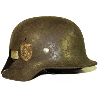 Waffen SS M35 DD helmet Mountain Div. NORD, battle damaged. Espenlaub militaria