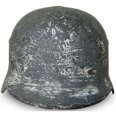 M35 Battle damaged double decal camo steel helmet