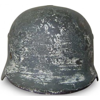 M35 Battle damaged double decal camo steel helmet. Espenlaub militaria