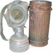 Early 1st model gasmask with canister