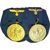 2 Medallas por Servicio en la Wehrmacht: por 4 años y por 12 años.